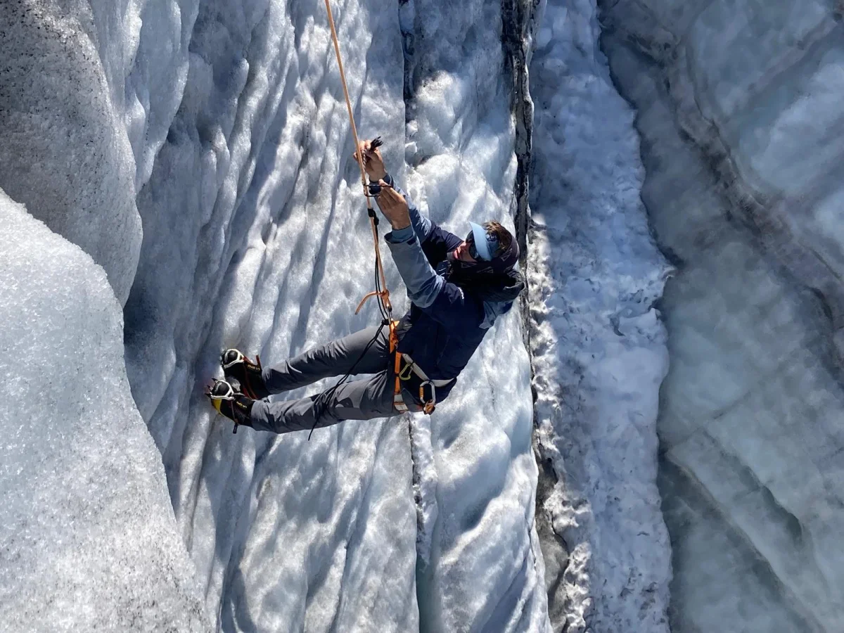 Beginner-Friendly Glacier and Mountaineering Course: Mountaineer practising on a steep glacier ice wall.
