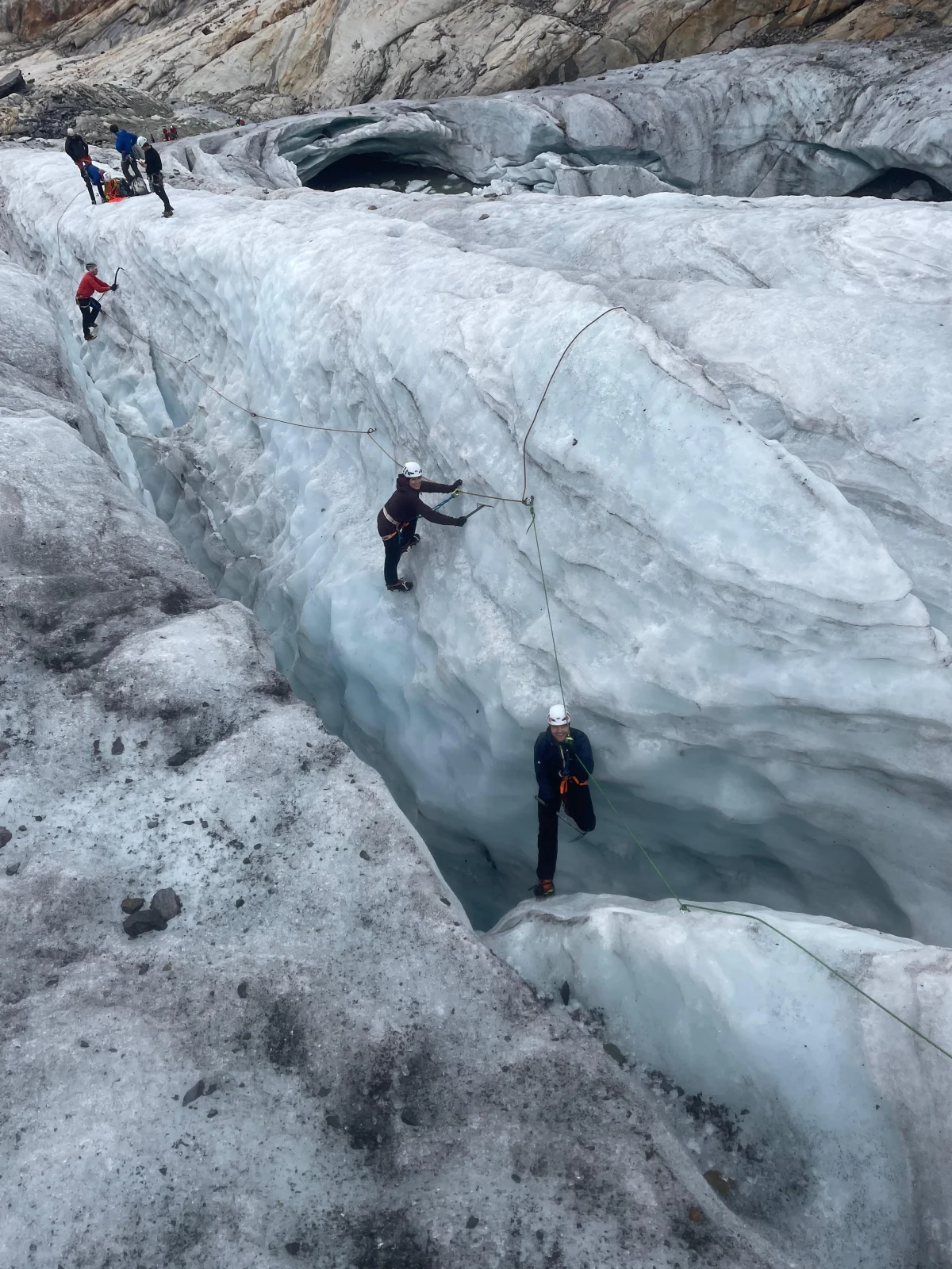 Beginner-Friendly Glacier and Mountaineering Course: Roped training beside a glacier crevasse.