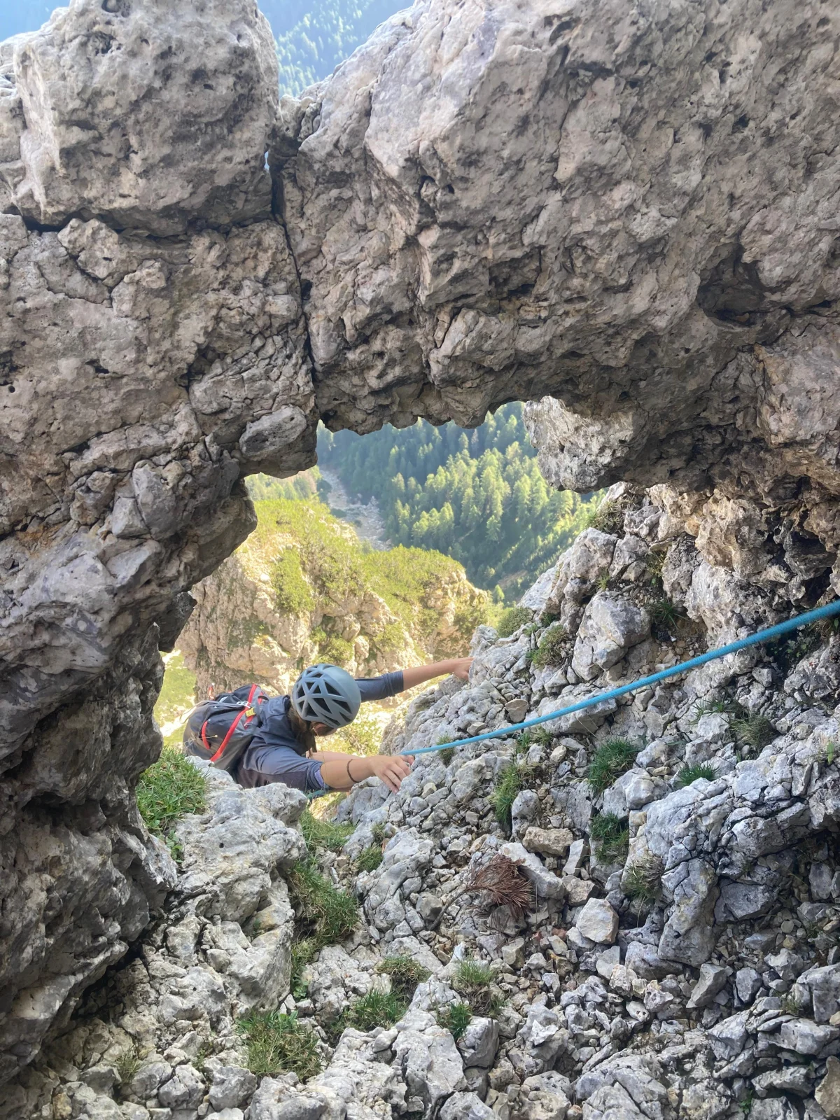 Burgstallkante – Dolomite Classic with Mountain Guide: Climbing passage through a natural rock window.