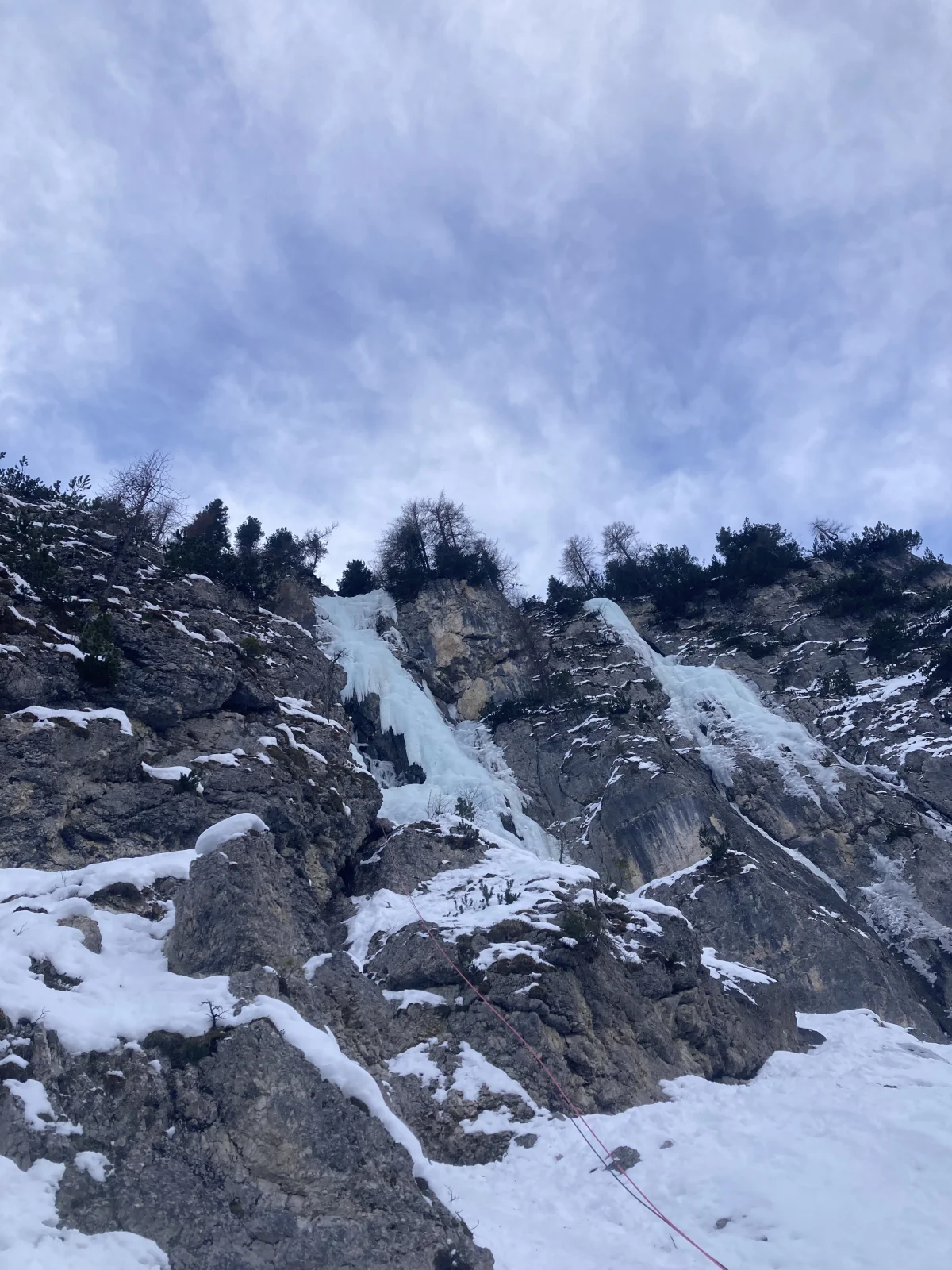 Ice Climbing in Colfosco with a Mountain Guide: Snow-covered rock steps and icy gullies.