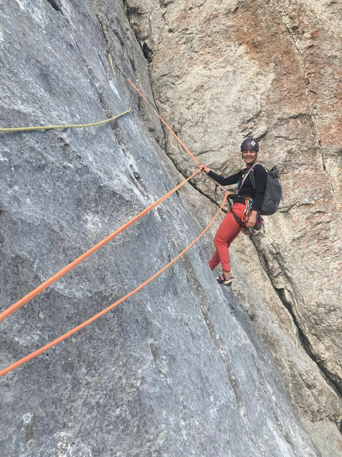 Fleischbank East Face – Dülfer Route: Roped climber traversing a rock wall.