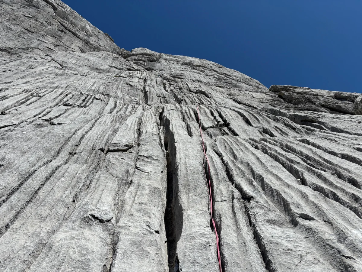 Freispitz South Face – Schreck Heel: Distinctive limestone runnels with a climbing rope.