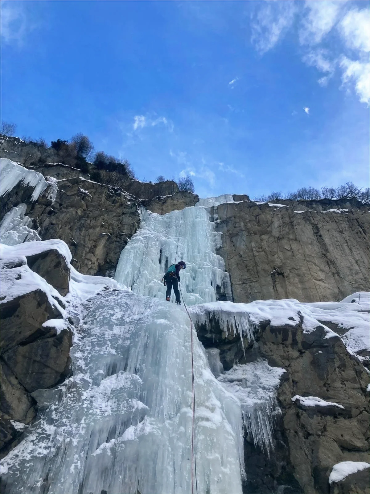 Gelber Fluss – Ice Climbing in the Kaunertal: Ice climber above a stepped ice wall.