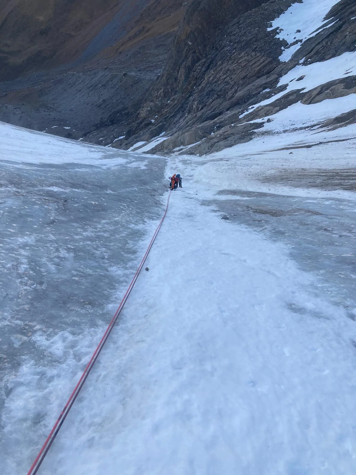 Hochferner North Face with a Mountain Guide: Mountaineer in a long icy gully.