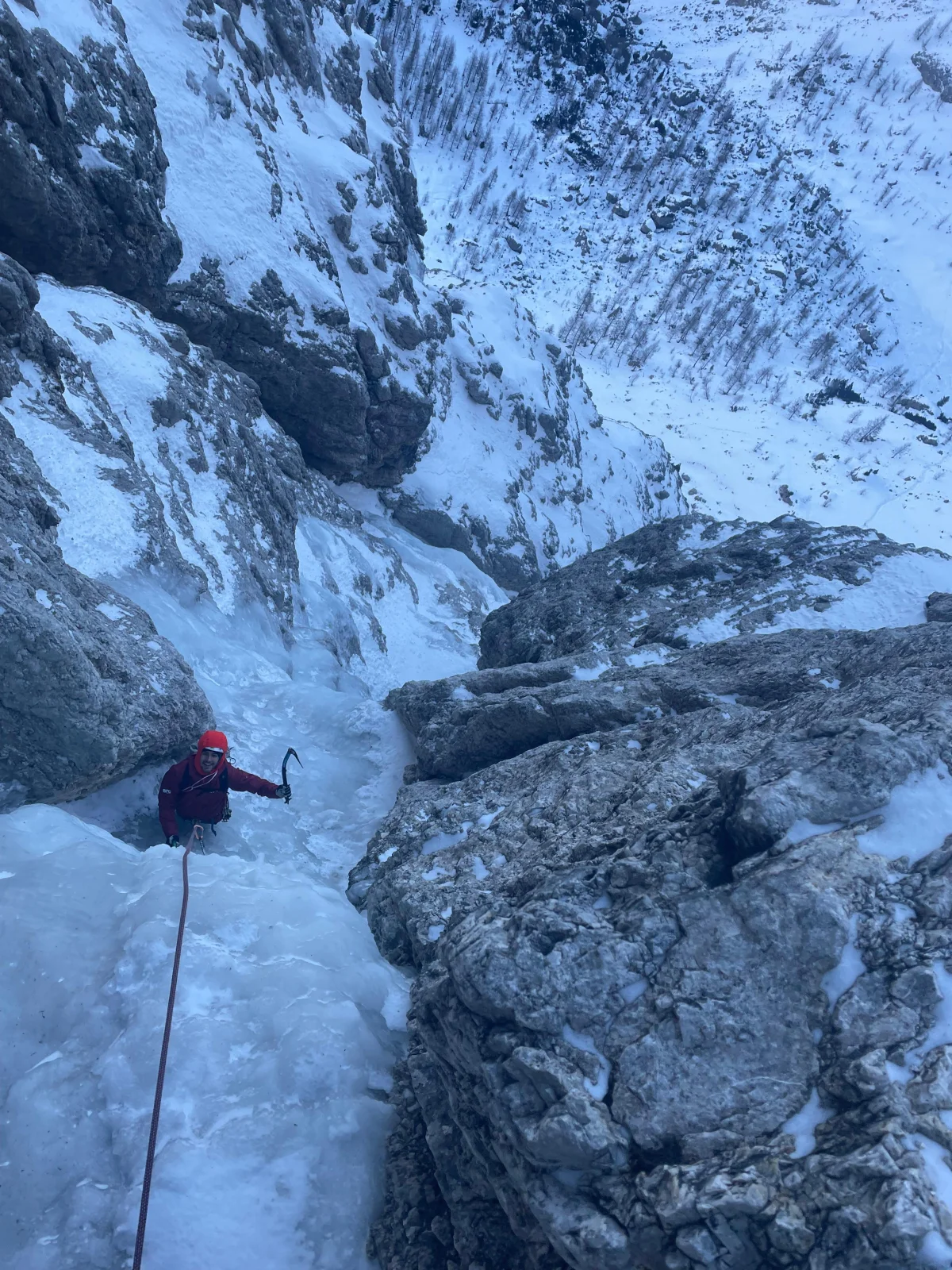 Hurschka – Val Mezdi – Guided Mixed Climbing Tour: Following ice climber in a narrow gully.