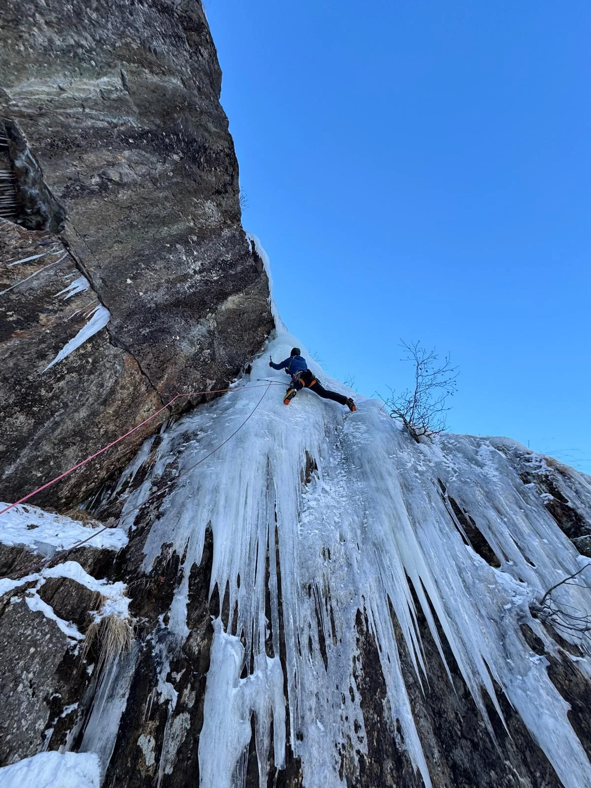 Individual Ice Climbing Course in the Stubai Valley: Frozen waterfall between rock walls.