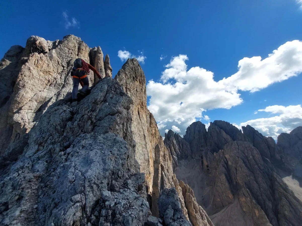 Kasnapoff – Second Sella Tower: Climber in a steep rock chimney.