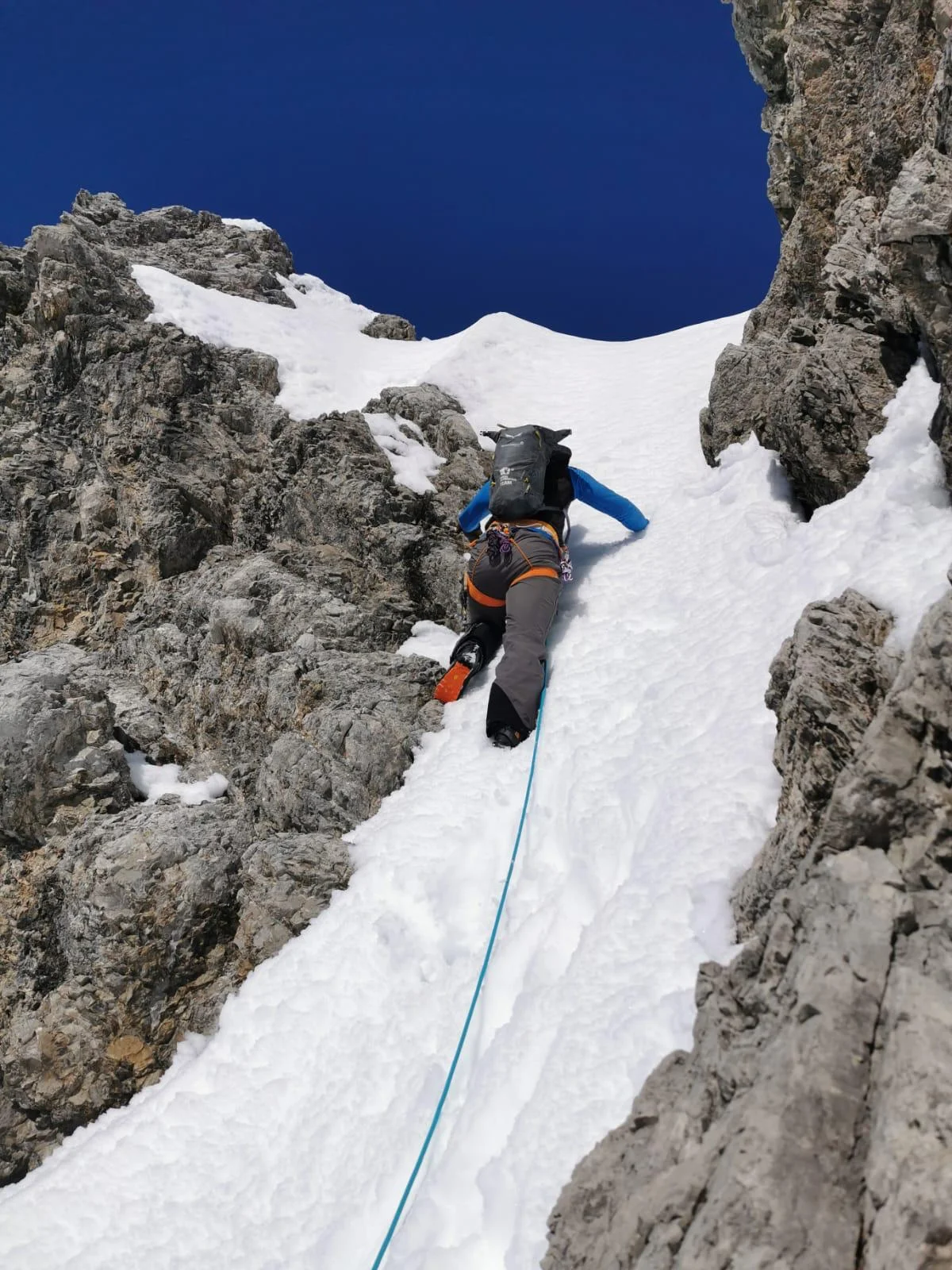 Ski Touring in the Lechtal with a Ski Guide: Roped mountaineer in a steep snow gully.